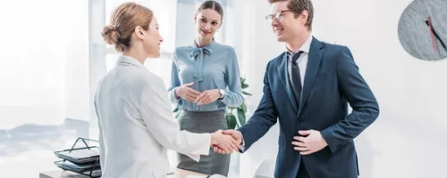 depositphotos_254317086-stock-photo-cheerful-recruiter-shaking-hands-woman